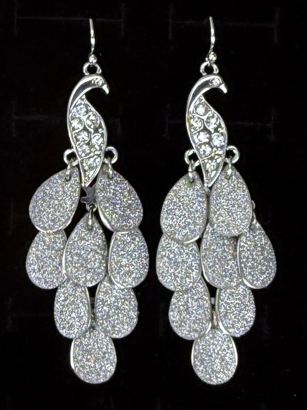 Silvertone peacock frosted feather lightweight pierced earrings